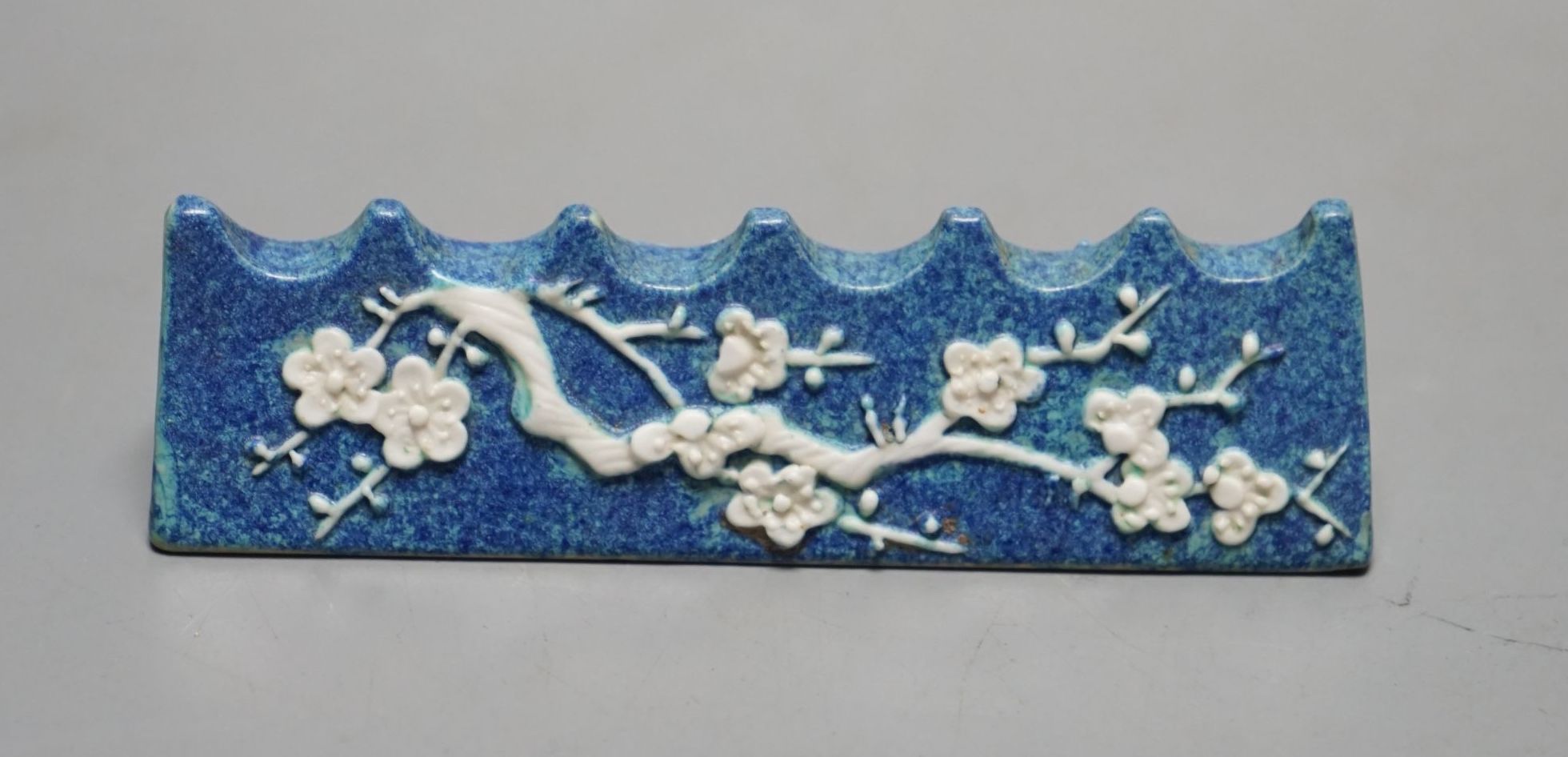 A Chinese robin's egg glazed brush rest, 19th century, 10 cms wide.